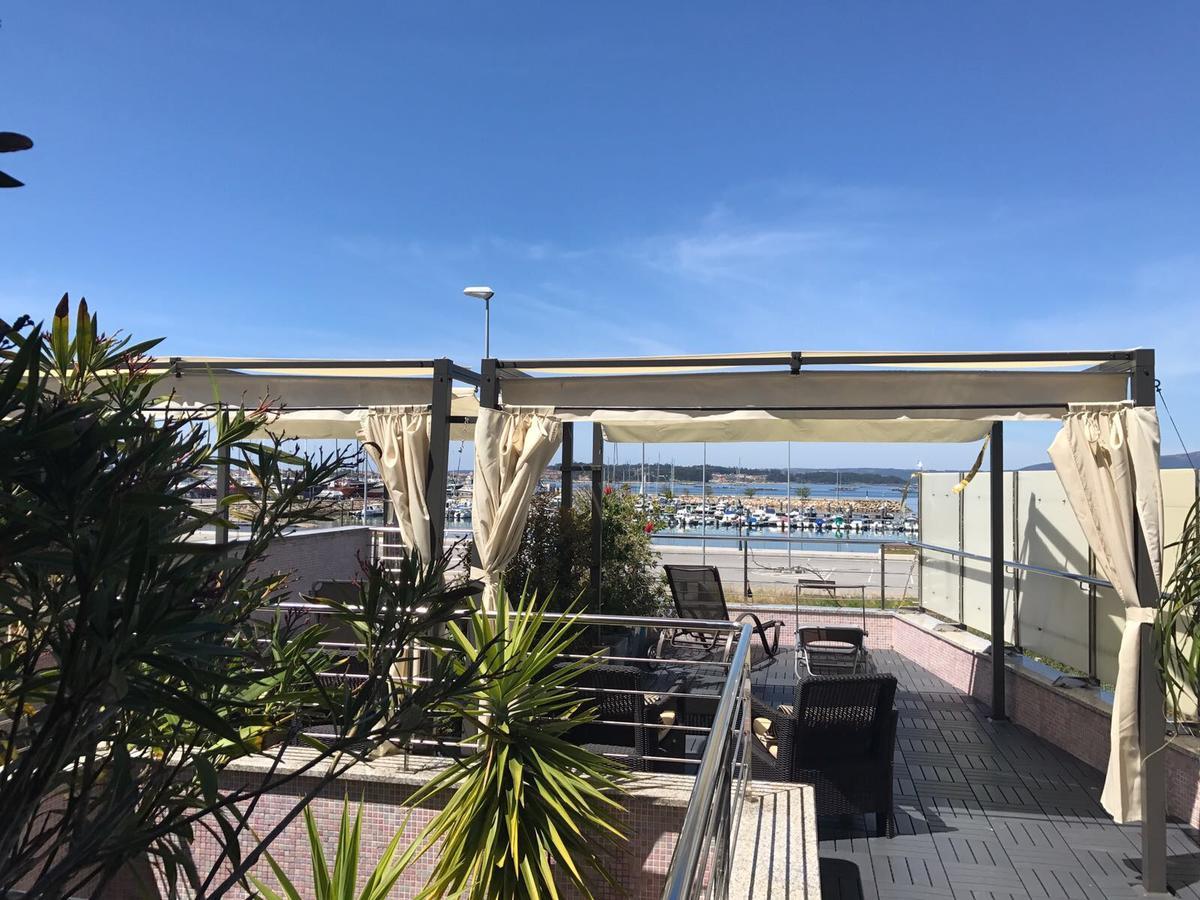 Apartamentos Puerto Basella Вильянуэва-де-Ароса Экстерьер фото