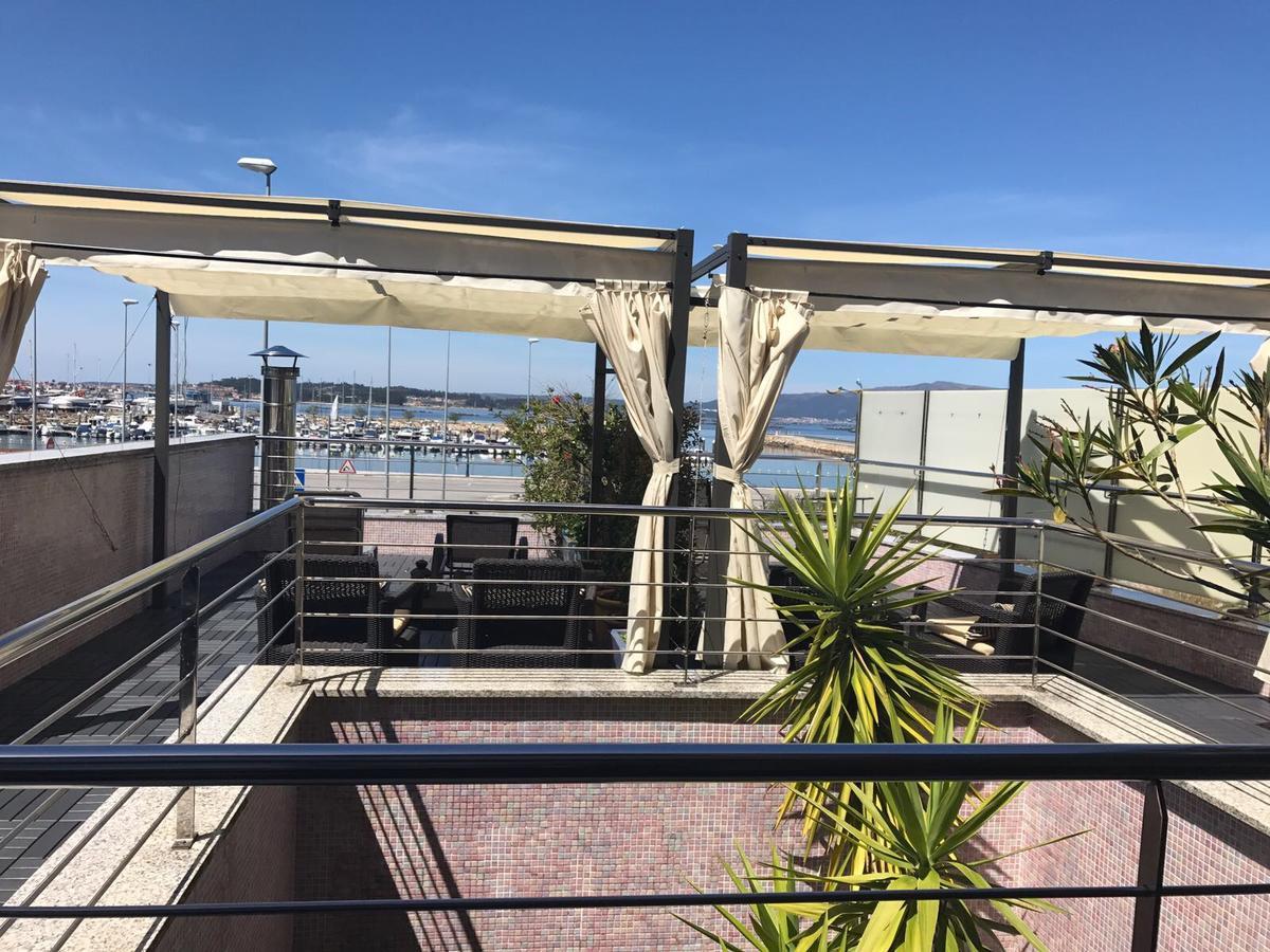 Apartamentos Puerto Basella Вильянуэва-де-Ароса Экстерьер фото